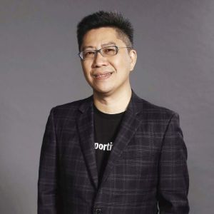 Managing Director-Patrick Mao HUANG